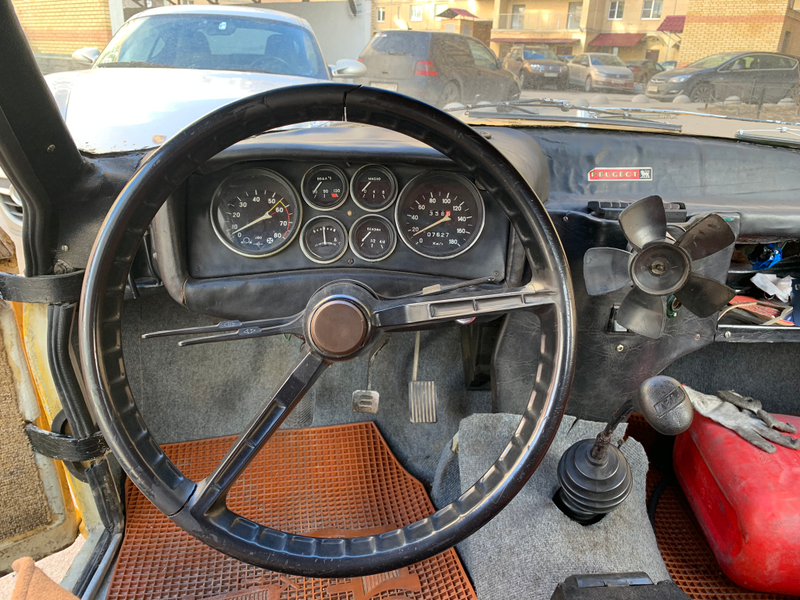 The LamborZhiga’s interior. See, the shifter is from a Fiat—yet more evidence of collusion with Lancia! Also, gauge cluster is from what looks like a VAZ 2103 or 2106.
